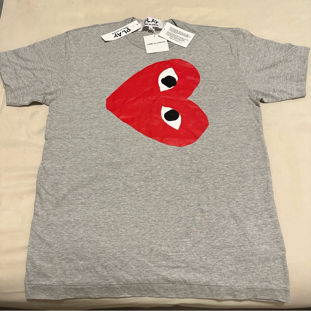 Comme des garçon brand new with tags size L hard to find in this size